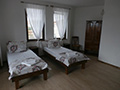 a bedroom with two signle beds